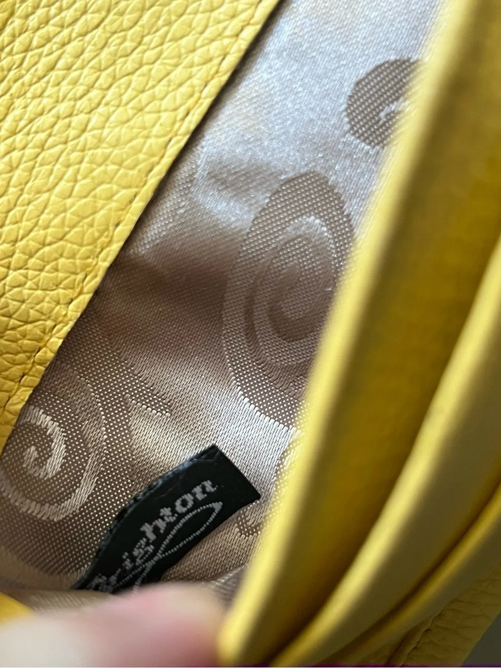 Brighton Nolita yellow pebbled leather wallet silver hardware magnetic closure